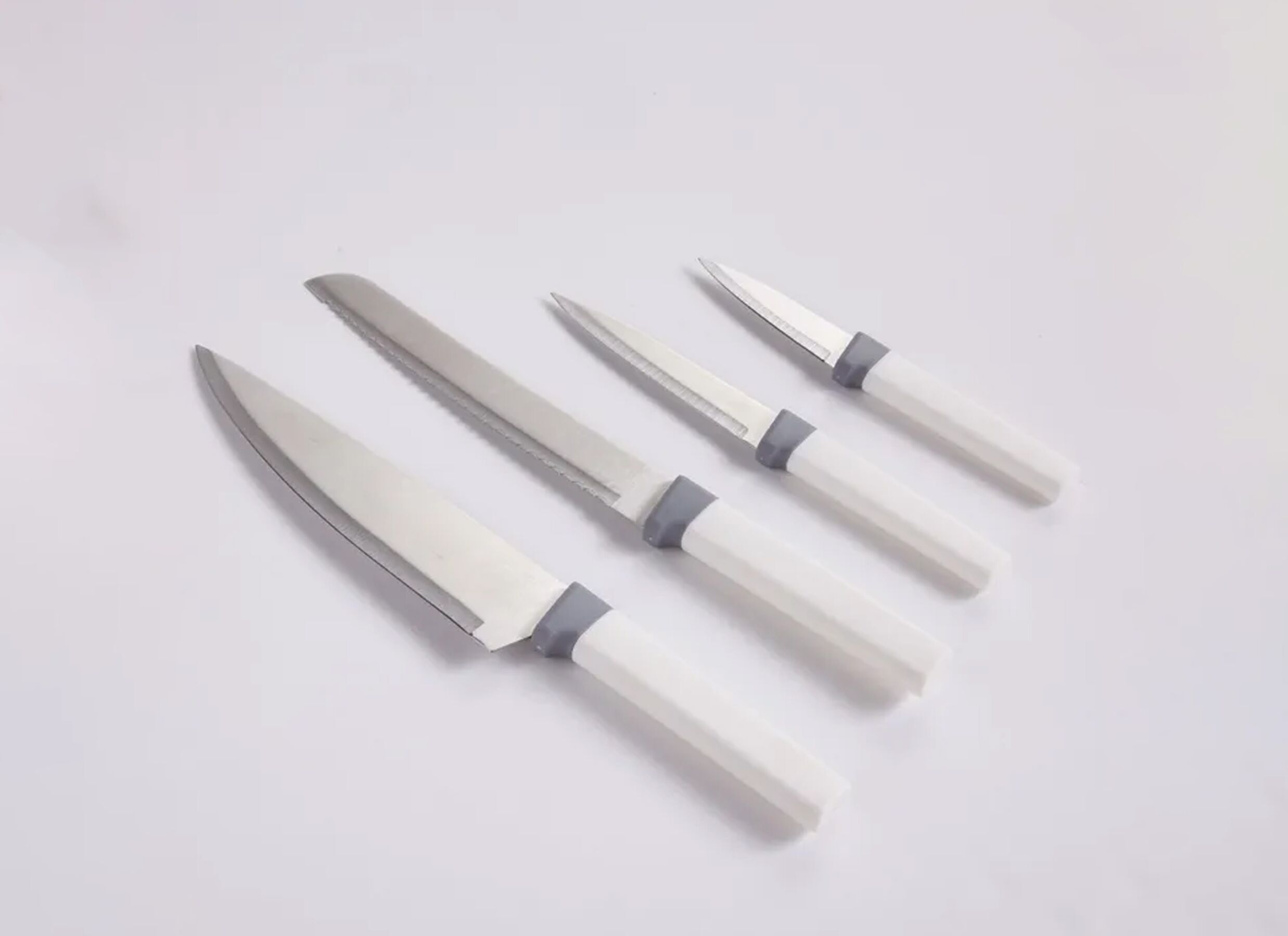 Foto ambiance - Set de couteaux lot de 4 - acier inoxydable & plastique - blanc