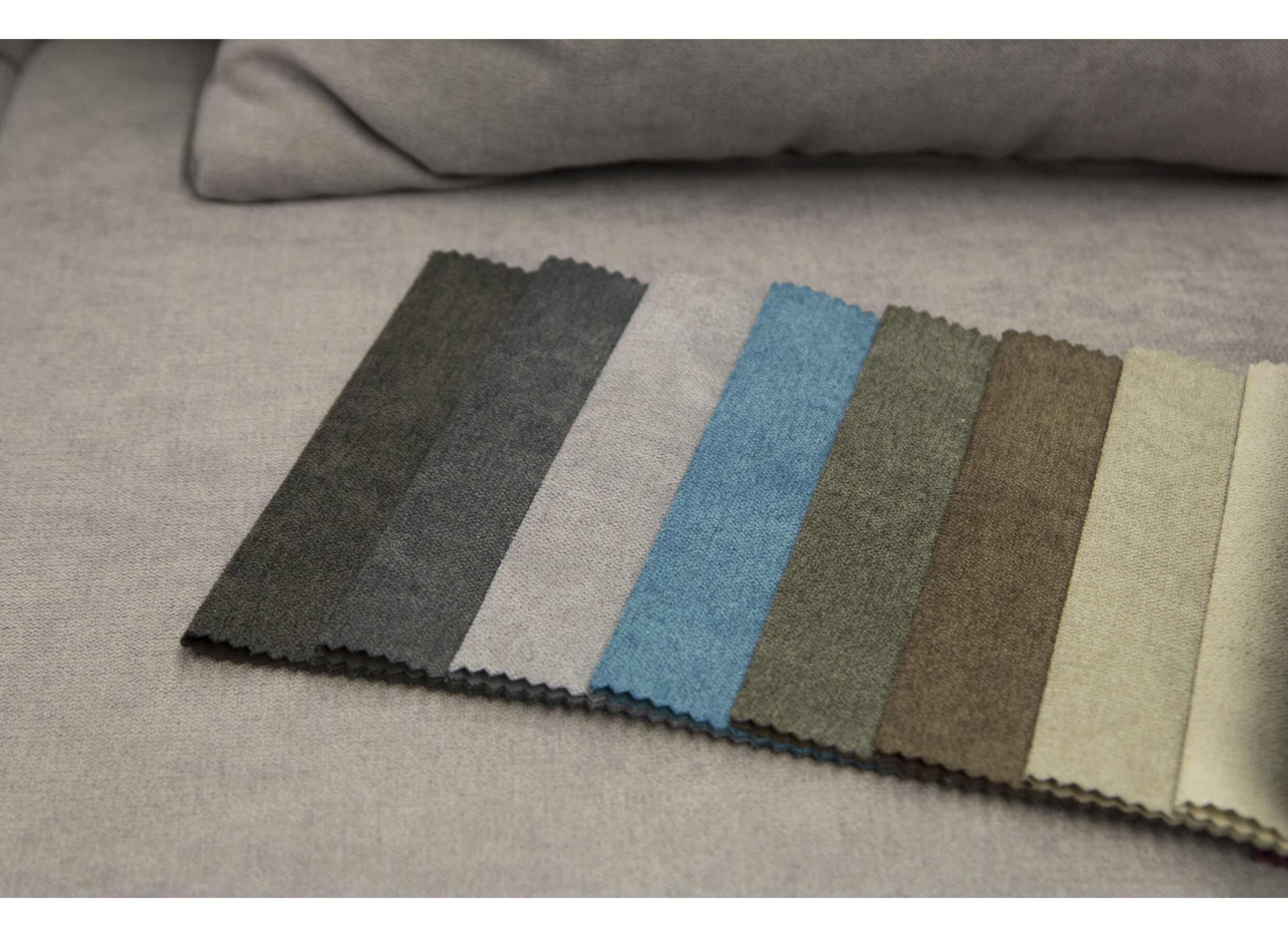 Canapé d'angle Caro 272x197cm - tissu - gris moyen avec fonction de lit et rangement
