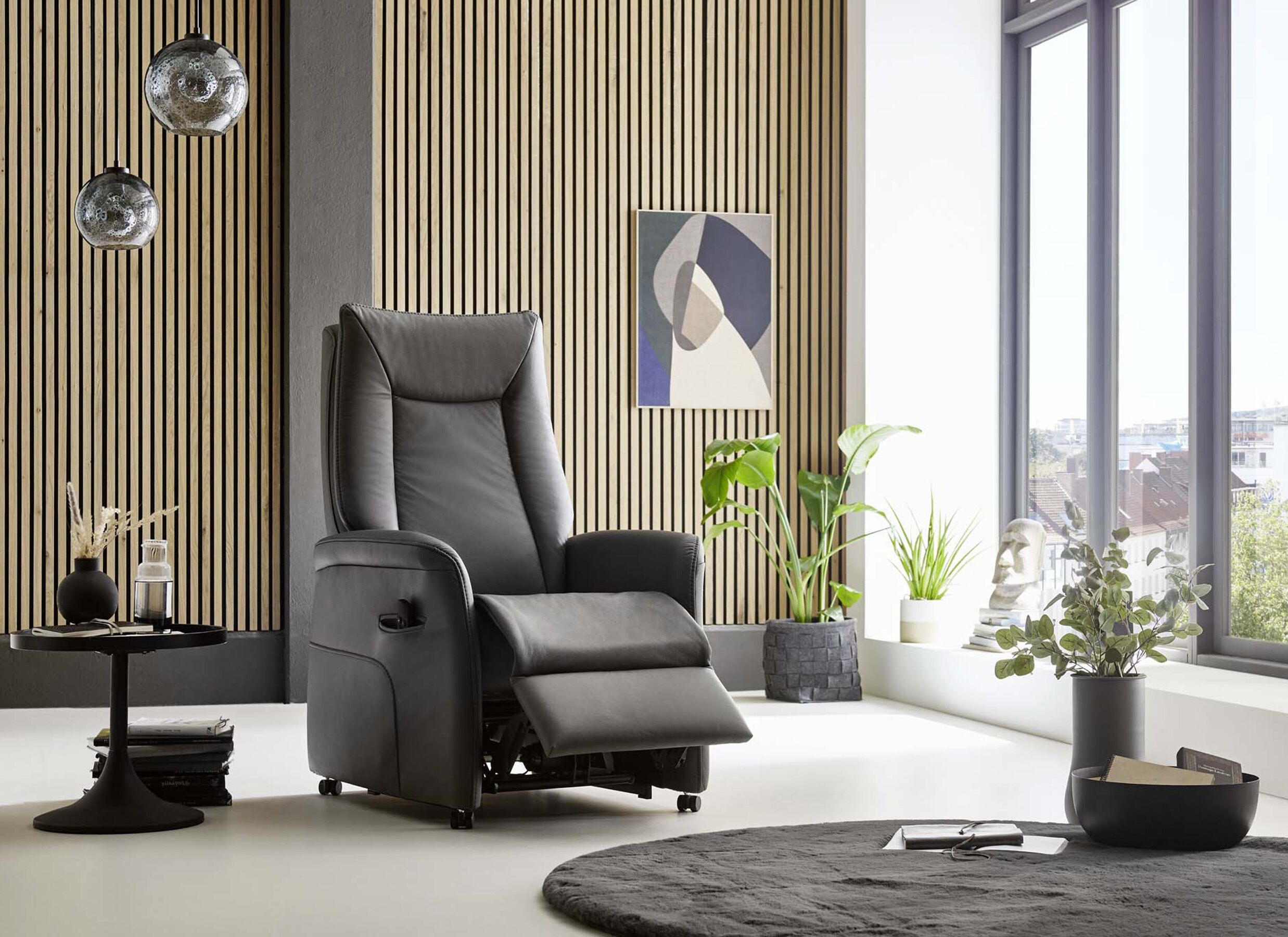 Sfeerfoto - Relaxzetel Hukla elektrisch - leder - antraciet met 2 motoren & extra lange beensteun
